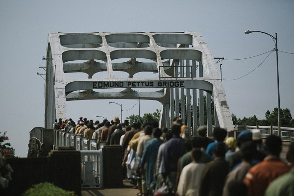 Marchers cross the Edmund Pettus Bridge in SELMA, from Paramount Pictures, Pathé, and Harpo Films.